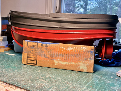 With tugs & workboats I prefer to paint the hull early on. Then the scrapes, dents, bangs, etc that occur during the building process add realistic weathering to  the finished build.